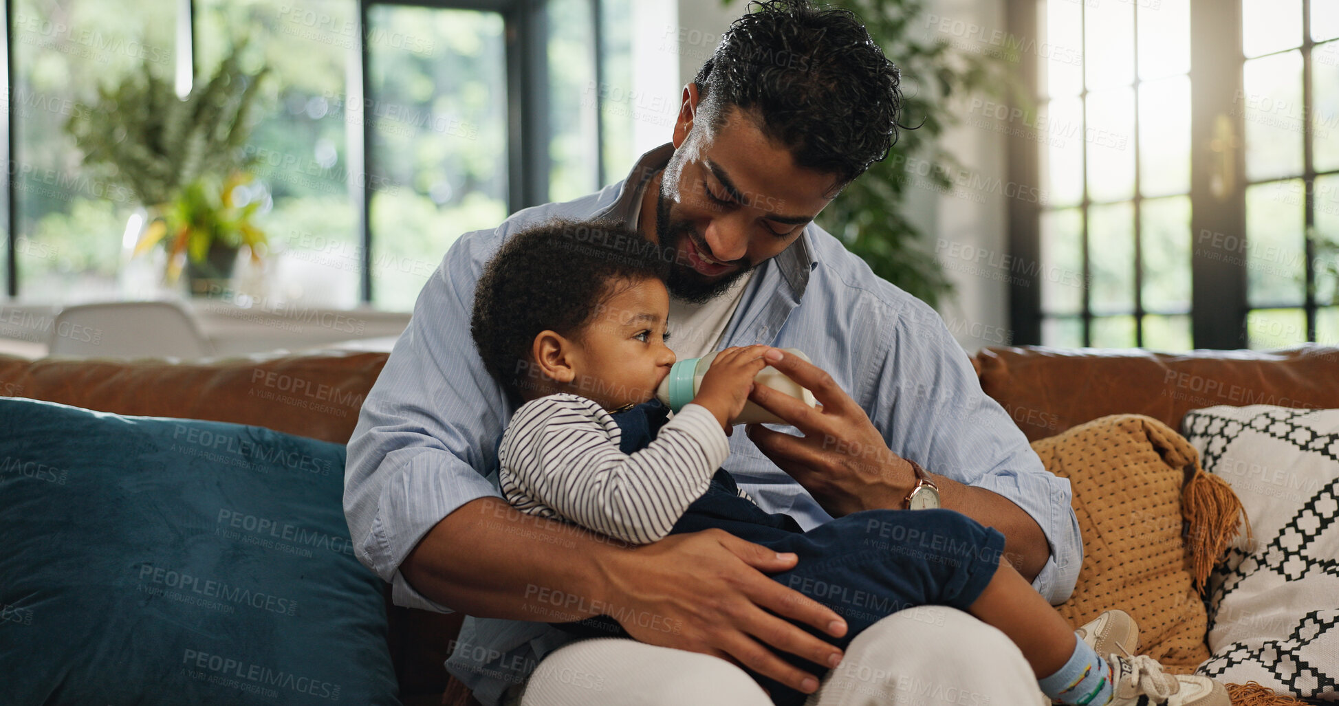 Buy stock photo Home, father and baby with bottle, love and bonding together with nap time, wellness and smile. Toddler, parent and dad with kid, child development and feeding with nutrition, growth and family