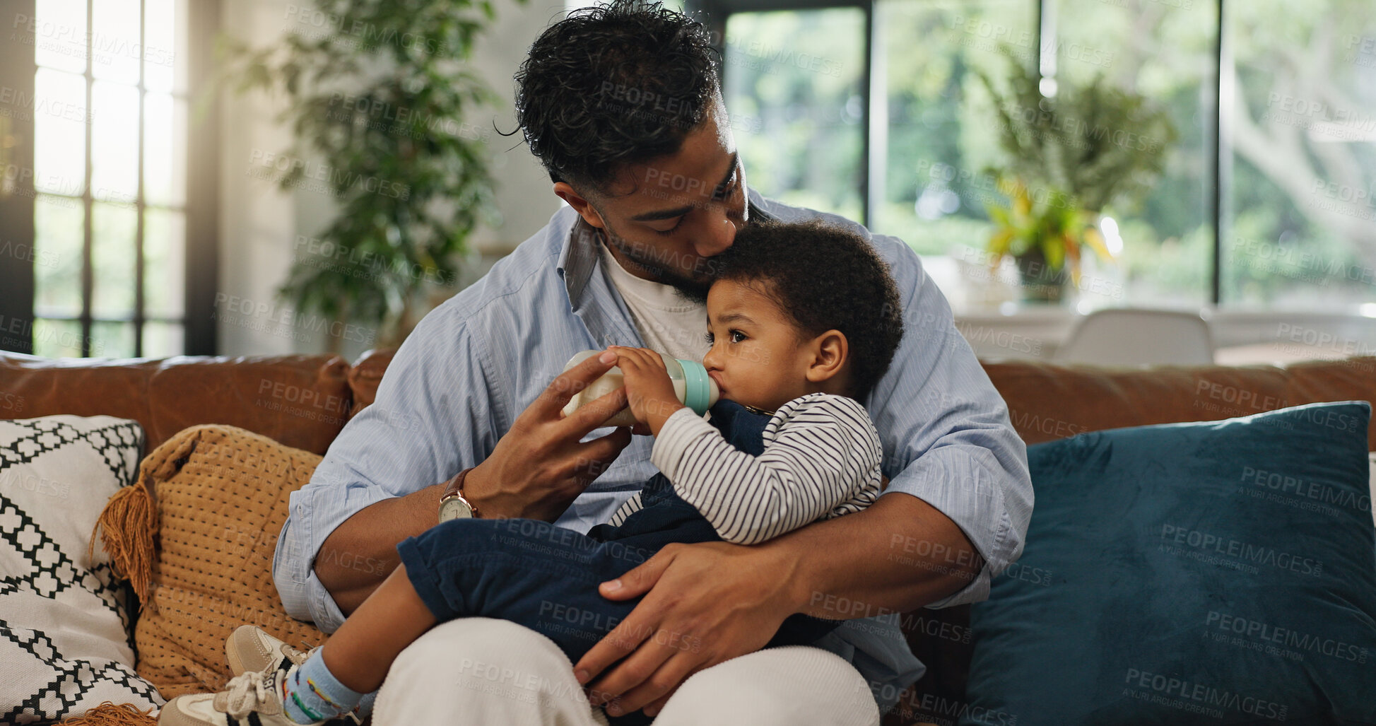 Buy stock photo Home, father and baby on sofa, bottle and bonding together with nap time, wellness and love. Apartment, parent and dad with kid, child development and feeding with nutrition, growth and toddler