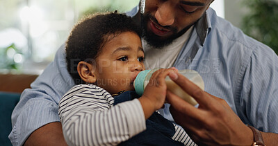 Buy stock photo Home, father and baby with bottle, feeding and bonding together with nap time, wellness and care. Toddler, parent and dad with infant, child development and health with nutrition, growth and love