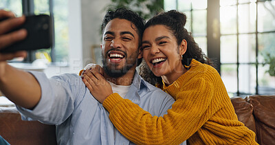 Buy stock photo Home, selfie and couple on couch, smile and bonding together with marriage, embrace or relax. Apartment, happy man or woman on sofa, profile picture and relationship with romance, love or memory