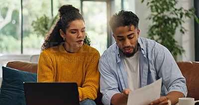 Buy stock photo Financial analysis, home and couple with documents, talking or discussion with information or bills. Asset management, online and people with paperwork in living room, laptop and planning in house