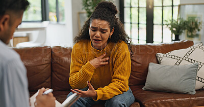 Buy stock photo Sad, anxiety and woman on sofa for therapy, session and support for healing with therapist. Psychology, mental health and person talking to social worker for consulting, discussion and evaluation