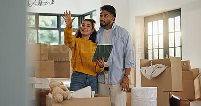 Buy stock photo Tablet, planning and moving with couple in new home for property, support and interior design. Real estate investment, layout research and relocation with man and woman in living room of house