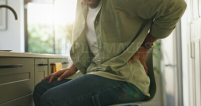 Buy stock photo Hands, man and back pain in kitchen at house for muscle tension, bad posture and joint strain. Male person, discomfort and spine injury with bone fracture, fibromyalgia and inflammation for arthritis