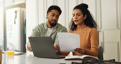 Buy stock photo Laptop, documents and research with couple in kitchen for bills, home loan and financial planning. Online banking, paperwork and budget review with man and woman reading in house for application