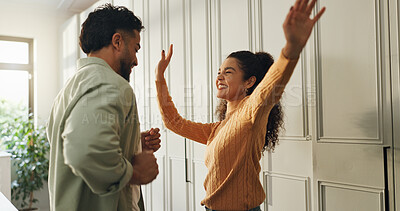 Buy stock photo Dancing, couple and fun in new home, laughing and celebration for milestone in kitchen or apartment. Happy, man and moving in with woman, love and achievement of mortgage, groove and rhythm in house