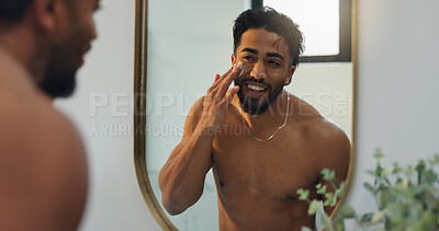 Buy stock photo Beauty, cream and mirror with man in bathroom for skincare, morning routine or moisturizer. Facial treatment, self care and cosmetics with person and lotion in home for collagen, dermatology and glow