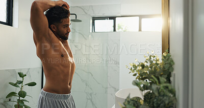 Buy stock photo Muscle, stretching  and mirror with man in bathroom for morning routine, workout transformation and health. Self care, bodybuilder pride and wellness with topless person in home for body and progress