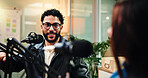 Podcast, conversation and man with woman in studio with guest for interview, discussion and talking. Content creation, hosting and people with mic for recording radio show, broadcast and live stream