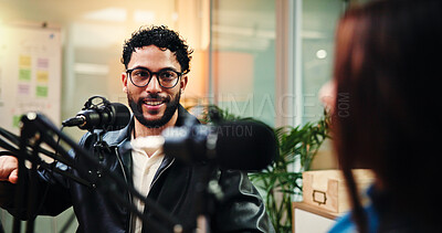 Buy stock photo Podcast, conversation and man with woman in studio with guest for interview, discussion and talking. Content creation, hosting and people with mic for recording radio show, broadcast and live stream