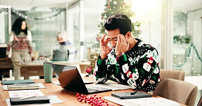 Buy stock photo Headache, Christmas and businessman in office with laptop for stress, burnout or fatigue for workload. Exhaustion, tired and financial advisor with migraine for documents and computer in xmas season.