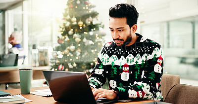 Buy stock photo Christmas, typing and businessman on laptop in office for finance report, proposal and profit for holiday. December, professional and person on computer for payroll bonus, financial review and budget