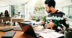 Xmas, business and man in office, documents and deadline for budget report, confused and checklist. Christmas, person and employee with paperwork, festive and revenue with finance agency and search