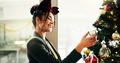 Buy stock photo Business woman, ornament and Christmas tree at office with baubles, happy and festive bow for event. Person, smile and excited with xmas celebration, lights and interior design at creative agency
