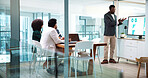 Businessman, presentation and team with charts, screen and point with stats, feedback or talk at meeting. Business people, speaker and monitor at office for finance results, graphs or group at agency