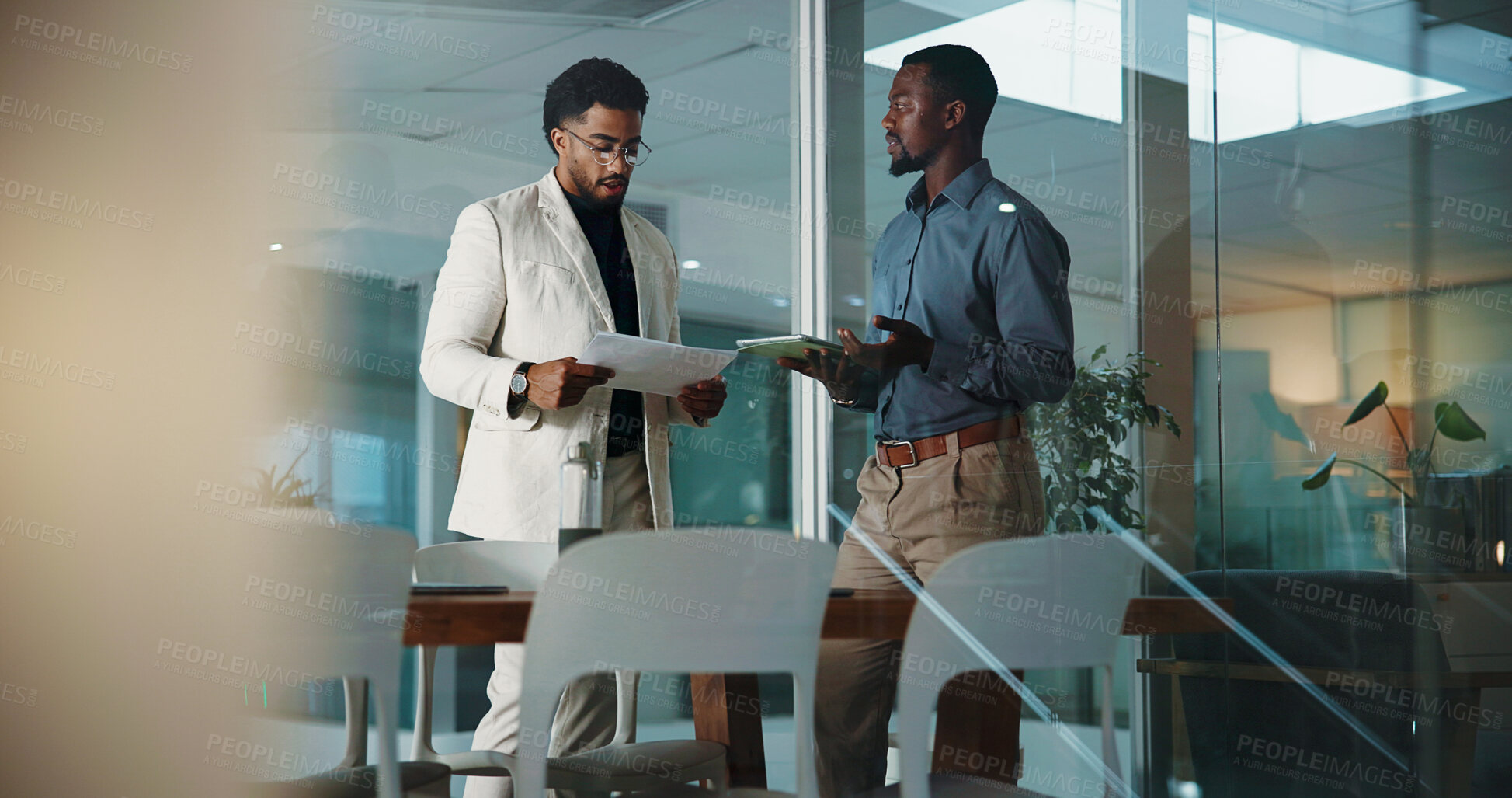 Buy stock photo People, tablet and document in office at night for accounting, financial planning and review budget. Men, team and digital with finance report, company expenses and information on investment deadline