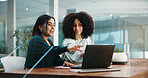 Laptop, feedback and meeting with business women in office for report, discussion and proposal. Collaboration, update and pointing with teamwork in workplace for conversation, review or strategy