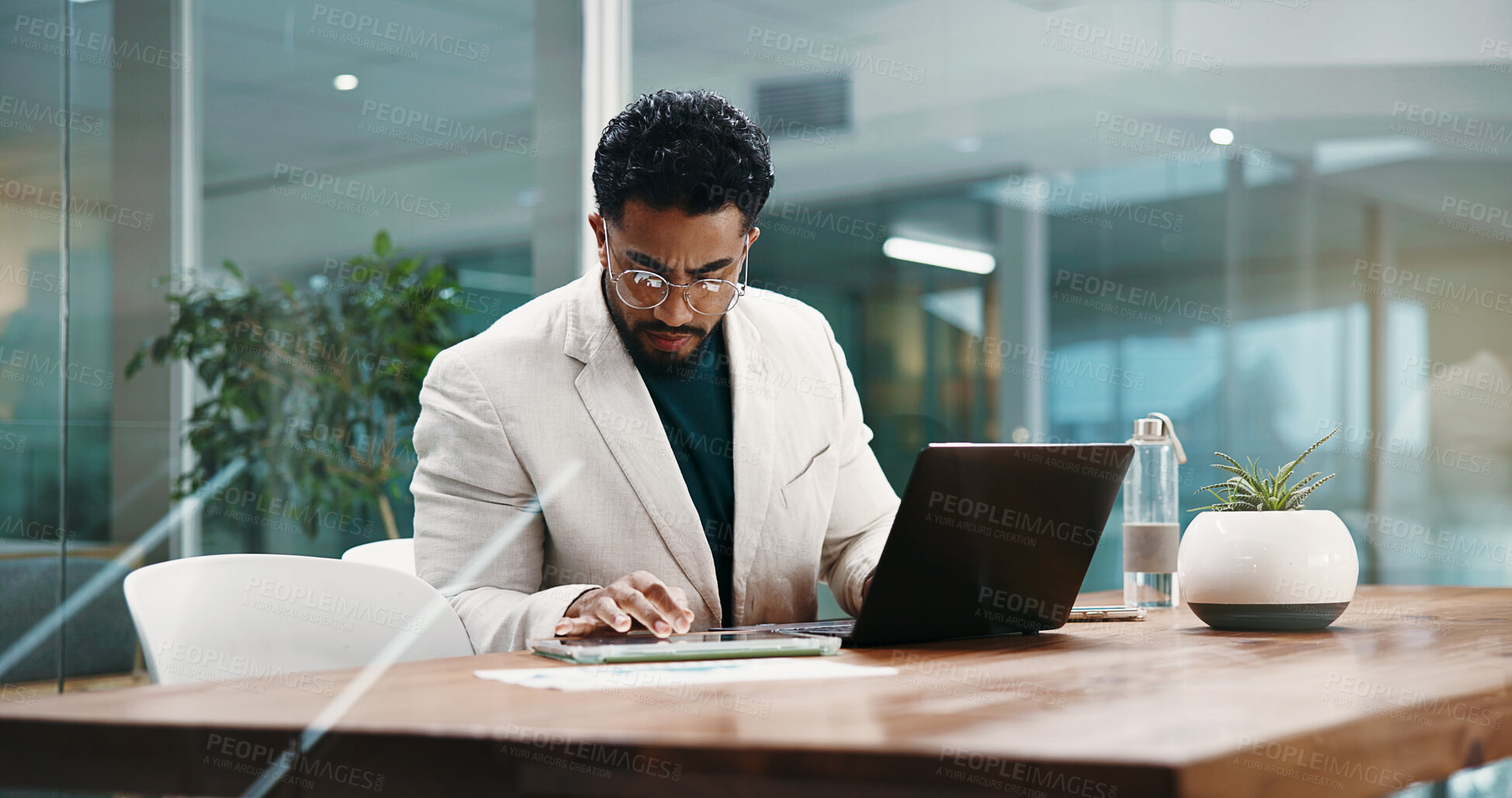 Buy stock photo Businessman, laptop and tablet for planning, feedback and schedule in office. Employee, HR manager and person with computer, thinking and project management for research proposal or report review