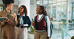 People, students and walk with tablet at college for research, prepare for exam and study group. Women, friends and project information, online results and education agenda for university assignment
