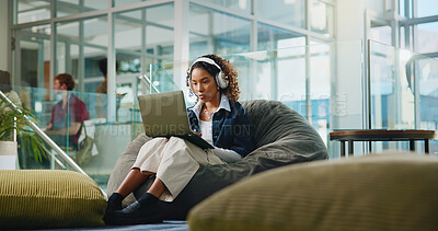 Buy stock photo Laptop, reading and headphones with student in college for assignment, online course and study. University, streaming podcast and research with woman on campus for virtual lesson and exam portal