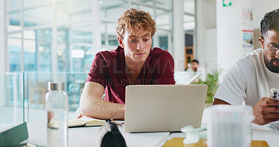 Buy stock photo Man, student and reading on laptop at college for research, prepare for exam and study in lounge. Person, pc and information on project, online results and education agenda for university assignment