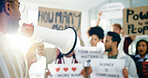 Social justice, movement and people with megaphone, opinion or community with protest for awareness. Revolution, group and loudspeaker for announcement of human rights, attention and demonstration