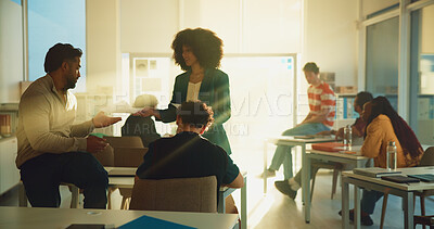 Buy stock photo Woman, teacher and test paper for students in classroom with results, notes and scholarship at college. Person, professor and assessment documents for exam, learning and education at university