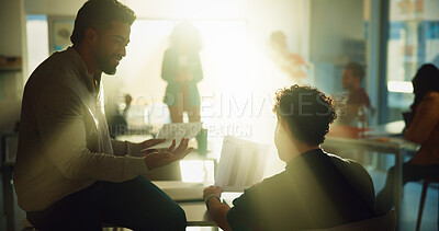 Buy stock photo University, student and men in classroom, talking and preparing for exam, lens flare and discussion. Happy, people and conversation with classmate in college, education and help for test or advice