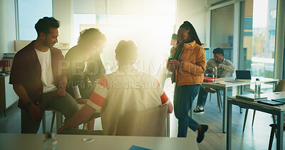 Buy stock photo Education, student and group in classroom, talking or preparing for exam, lens flare and discussion. Happy, people and conversation with classmate in college, together and help for test and advice