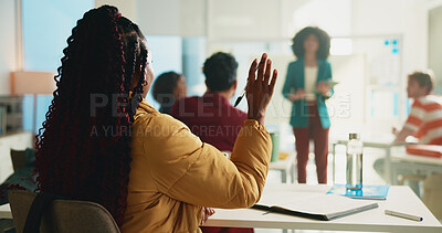 Buy stock photo Student, woman and question in classroom at university for learning, notes or raised hand for education. Person, back and attention with scholarship, gesture or solution with discussion at college