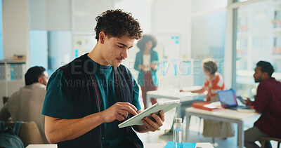 Buy stock photo Tablet, learning and man in university classroom for study, development or research project online. Technology, student or person in college for knowledge, reading thesis or scholarship for education