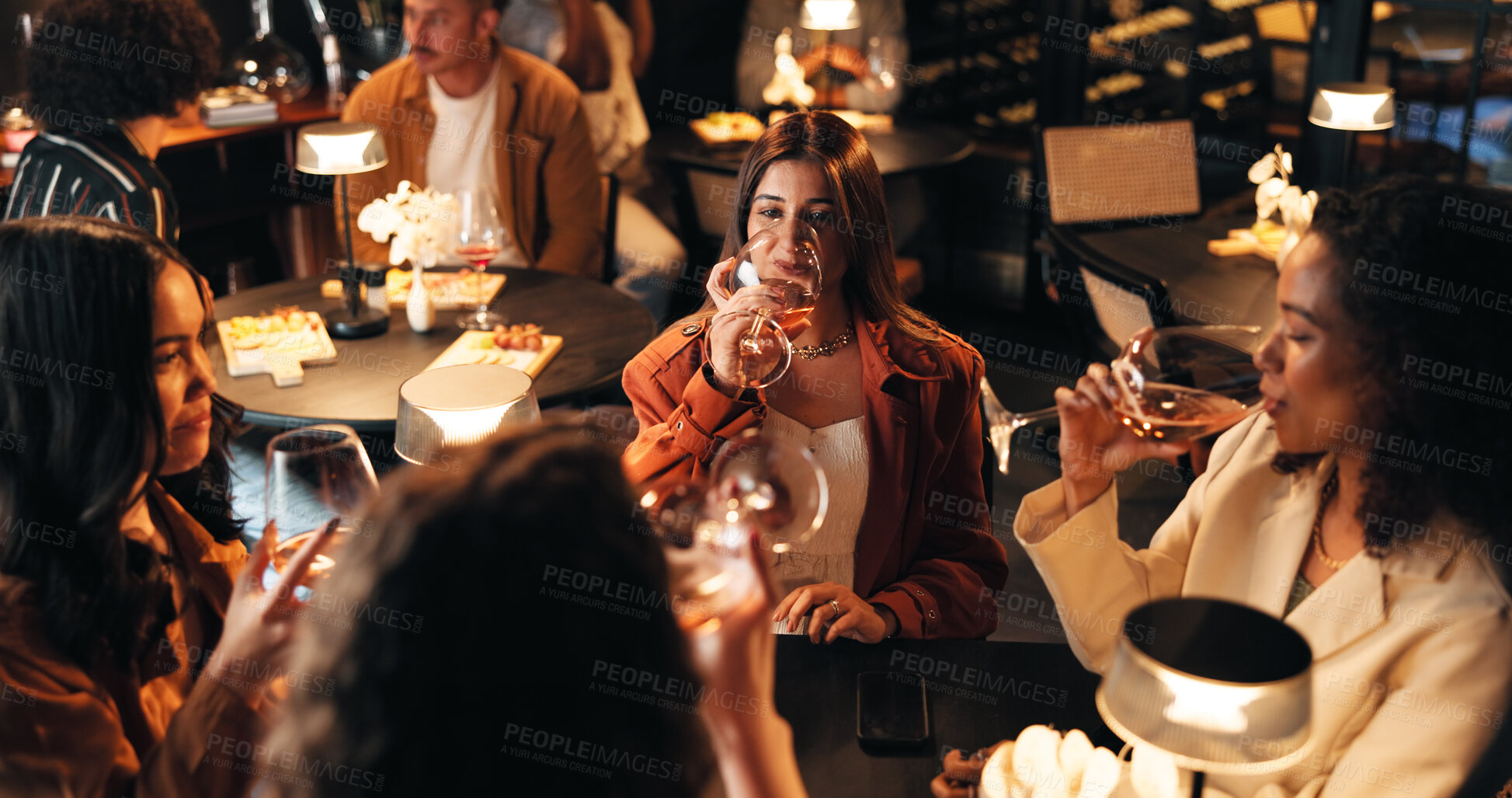 Buy stock photo Relax, wine and drinking with friends in restaurant for discussion, reunion and conversation. Fine dining, culture and gossip chat with women at table for weekend, nightlife and social event