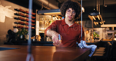 Buy stock photo Hygiene, waiter and man with spray, bar and chemical for cleaning, routine and sanitation for germs. Small business, disinfection and person with liquid for dirt, bacteria and maintenance at night