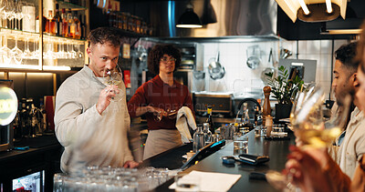 Buy stock photo Wine tasting, smell and man with glass in restaurant for customer service, order and hospitality. Nightclub, pub and bartender with drinks, beverage and liquid for serving people in happy hour