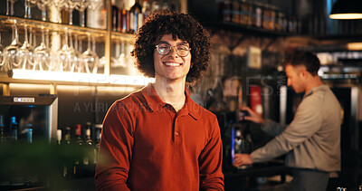 Buy stock photo Bartender, man or smile at counter in pub for friendly welcome, customer service or hospitality. Small business, manager and confidence at restaurant with portrait, ready for happy hour or management