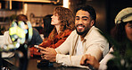 Happy man, waiting and bartender with phone for drink, social event or get together in local pub. Male person, group or smile with friends or mobile smartphone for night out or late evening in cafe
