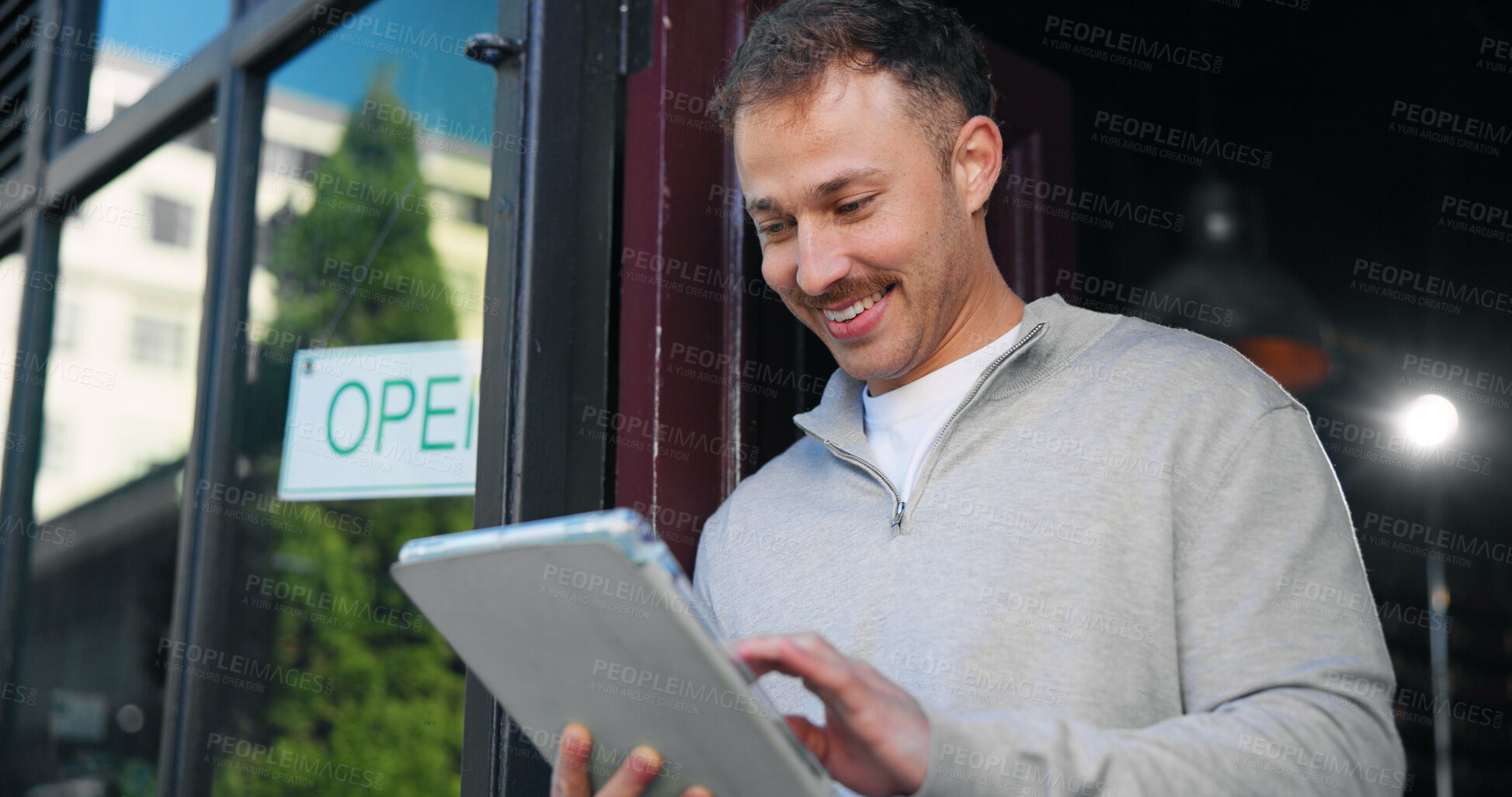 Buy stock photo Tablet, smile and front door with man at cafe for online reservation, menu planning and startup. Small business owner, restaurant manager and digital booking with person in coffee shop for franchise