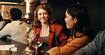 Wine tasting, restaurant and women at bar talking for networking, hangout and bonding on night out. Happy hour, friends and people with alcohol for social gathering, reunion and relax on weekend