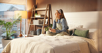 Buy stock photo Phone, relax and thinking with girl in bedroom of home for college or university communication. App, education and text message with happy student sitting on bed to check schedule for scholarship
