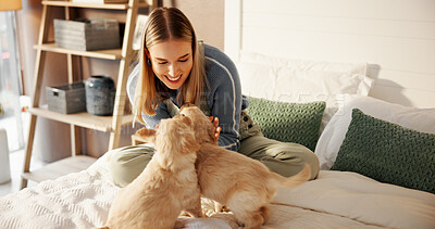 Buy stock photo Love, woman and playing with puppies on bed for connection, bonding together and pet insurance. Dog mom, happy owner and relax with furry animals in home for adoption, growth development and security