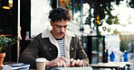 Remote work, tablet and man at outdoor cafe as social media marketer with research. Technology, coffee shop and serious freelancer check email for online engagement or campaign promotion in city