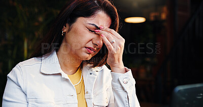 Buy stock photo Headache, stress and woman in coffee shop with fatigue, burnout or exhaustion with freelance career. Migraine, tired and female editor with frustration for creative remote work in restaurant.