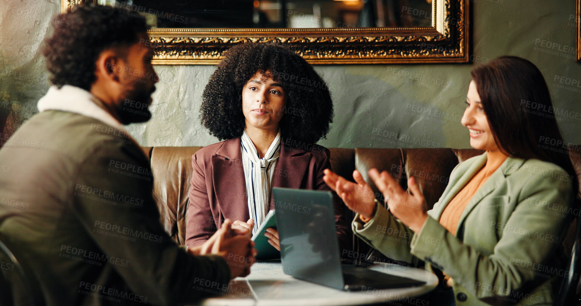 Buy stock photo Meeting, laptop and business people in coffee shop for discussion on proofreading for publishing. Explaining, conversation and female editors with author for book research in restaurant or cafe.