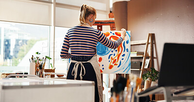 Buy stock photo Painting, woman and creative for artwork, studio or craft with color for canvas, talent and project. Back, draw and person with skills for design, artist and painter with paintbrush for hobby in home