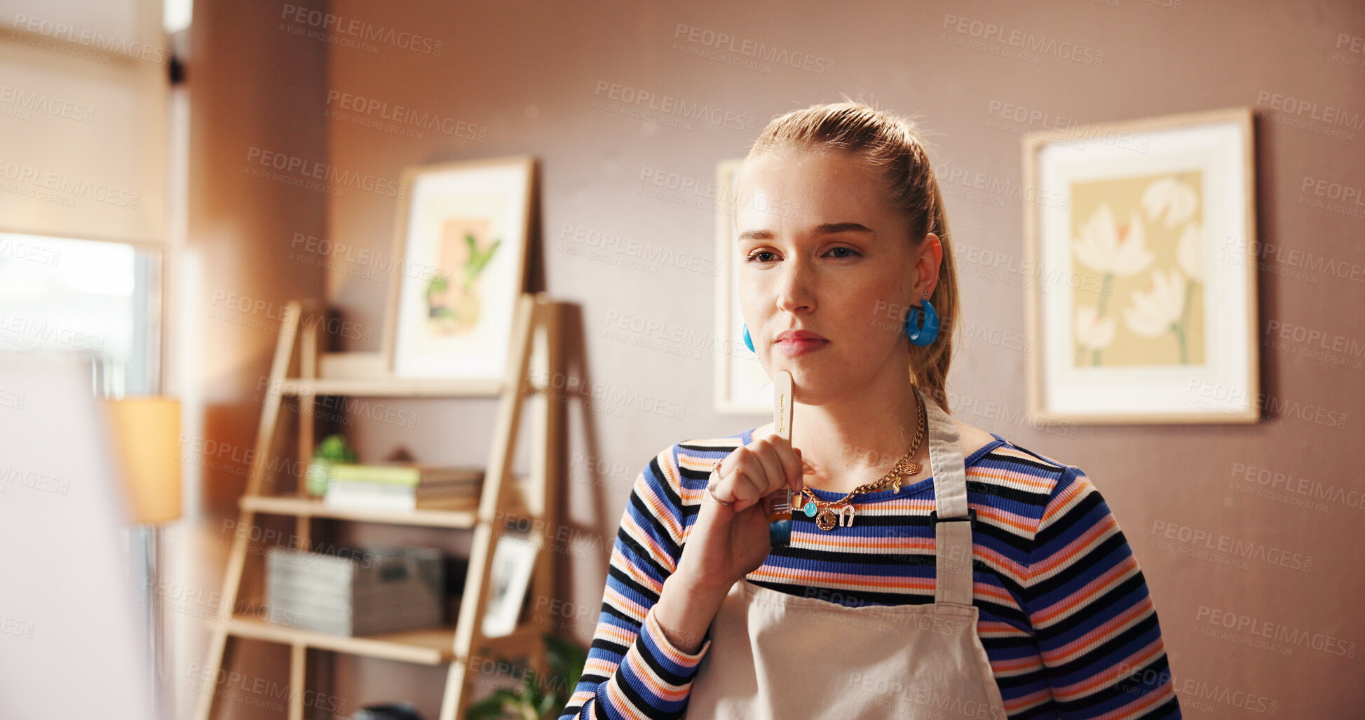 Buy stock photo Woman, painter and thinking with canvas, home studio and paint brush with perspective for artwork. Person, artist and tools with easel, inspiration and reflection with creative project at apartment