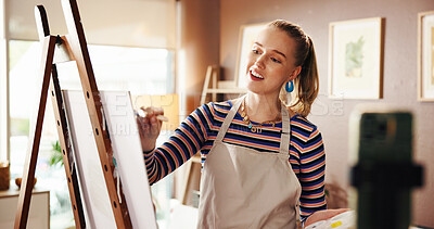 Buy stock photo Painter, canvas or phone for recording a video in home studio for painting process, advice or tips. Art influencer, artist and happy with live streaming to showcase craft, fans engagement and talent