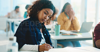 Buy stock photo Woman, college student and writing with book in classroom for development, learning and scholarship. Person, notes and attention with project, assessment and education with solution at university