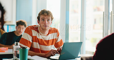 Buy stock photo Man, college student and listen in classroom with laptop, notes and development with education. Person, attention and computer for elearning, scholarship and knowledge assessment at university