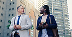 Colleagues, collaboration and travel to work, city and conversation for case with coffee or talking. Outdoor, attorney and people with latte on street, morning and discussion for trial and commuting