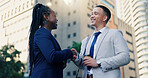 Handshake, meeting and business people in city, partnership or b2b deal with agreement. Employees, outdoor or financial consultant with cooperation, shaking hands or networking with investment agency